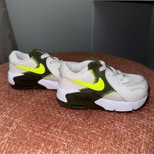 Nike off white and green baby shoes